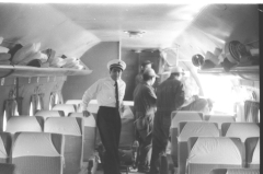 DC-4 Interior Purser Blas Zufic facing camera (panamericangrace.com).