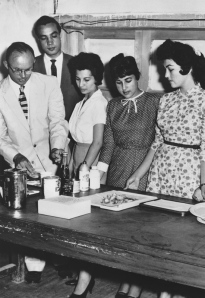 Afghan airline hostesses being trained in food-serving procedures.